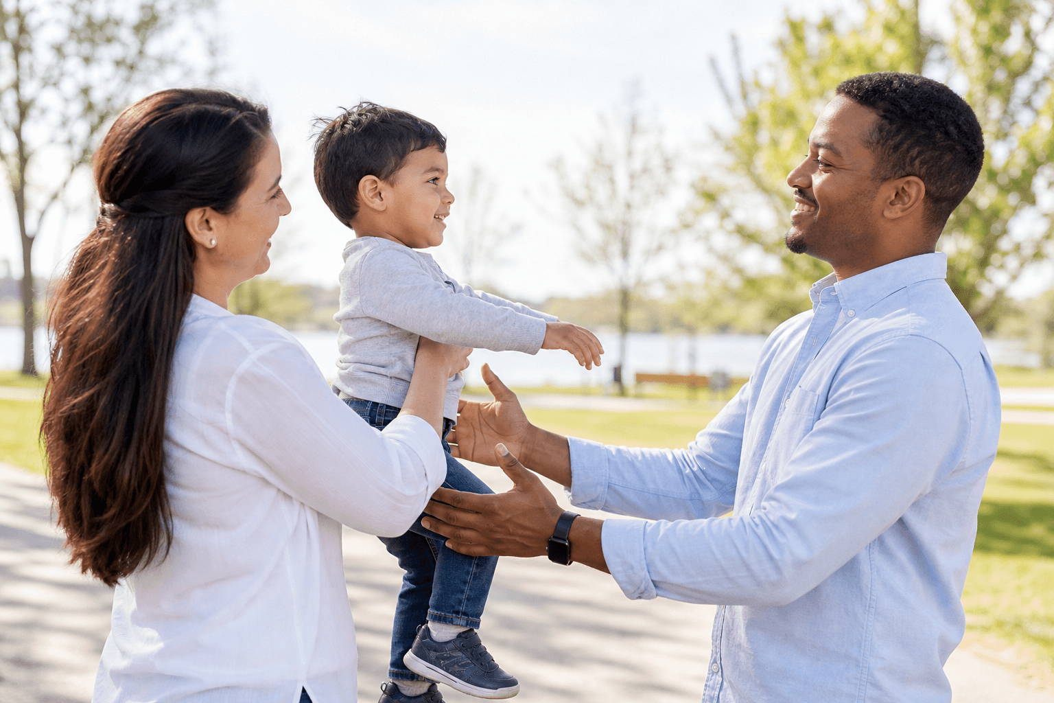 Co-parents exchanging care of their child
